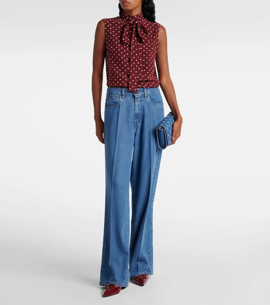 Christian Louboutin Paloma denim clutch